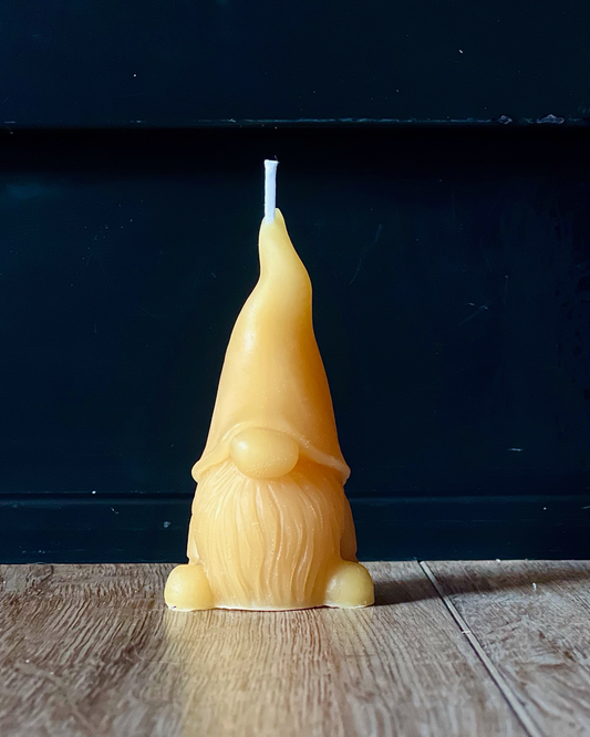 !00% beeswax candle in the shape of a 4" gnome.
